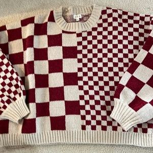 Pol New sweater in size Medium will fit up to large